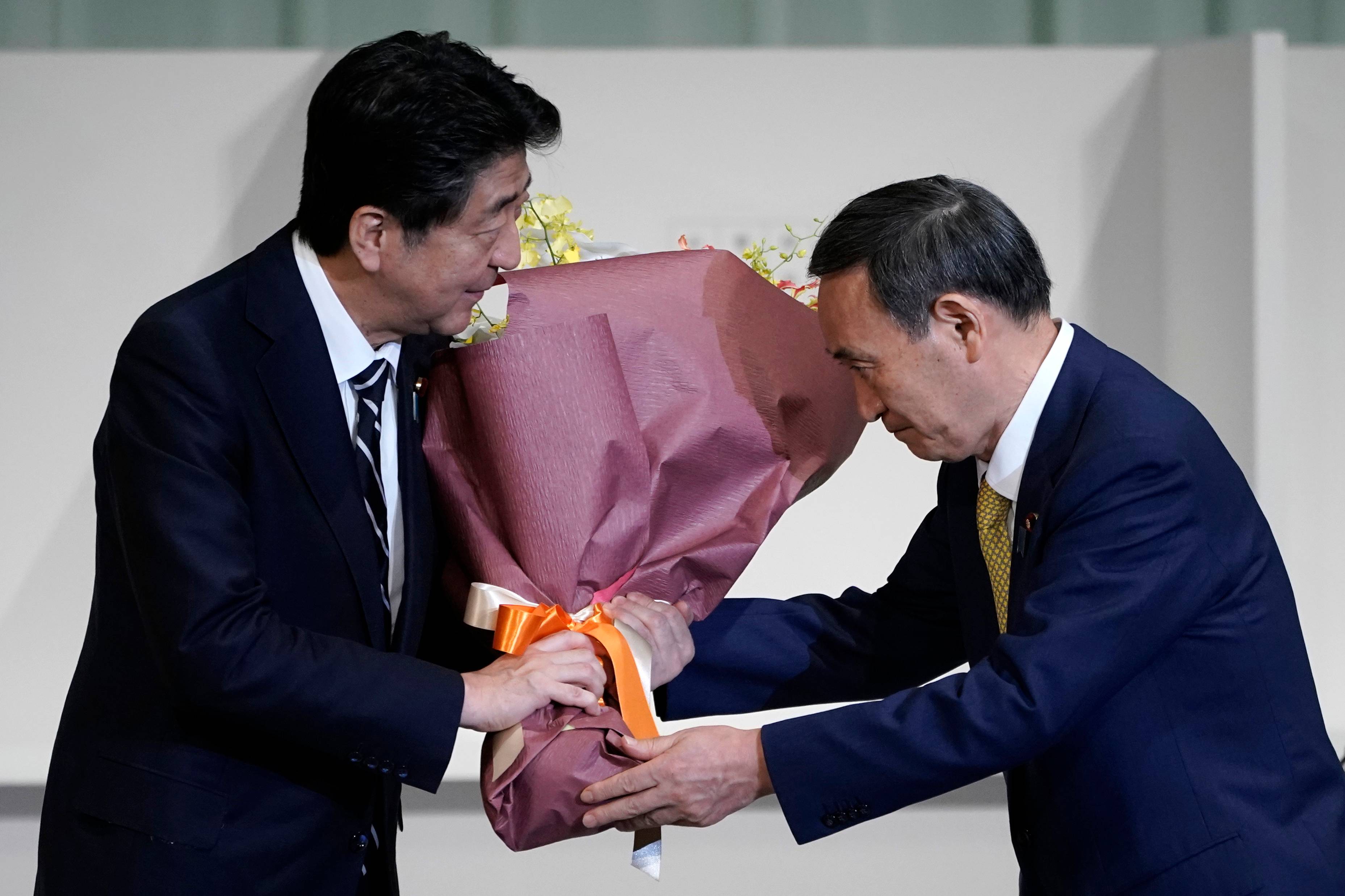 abe suga japão abe suga japão