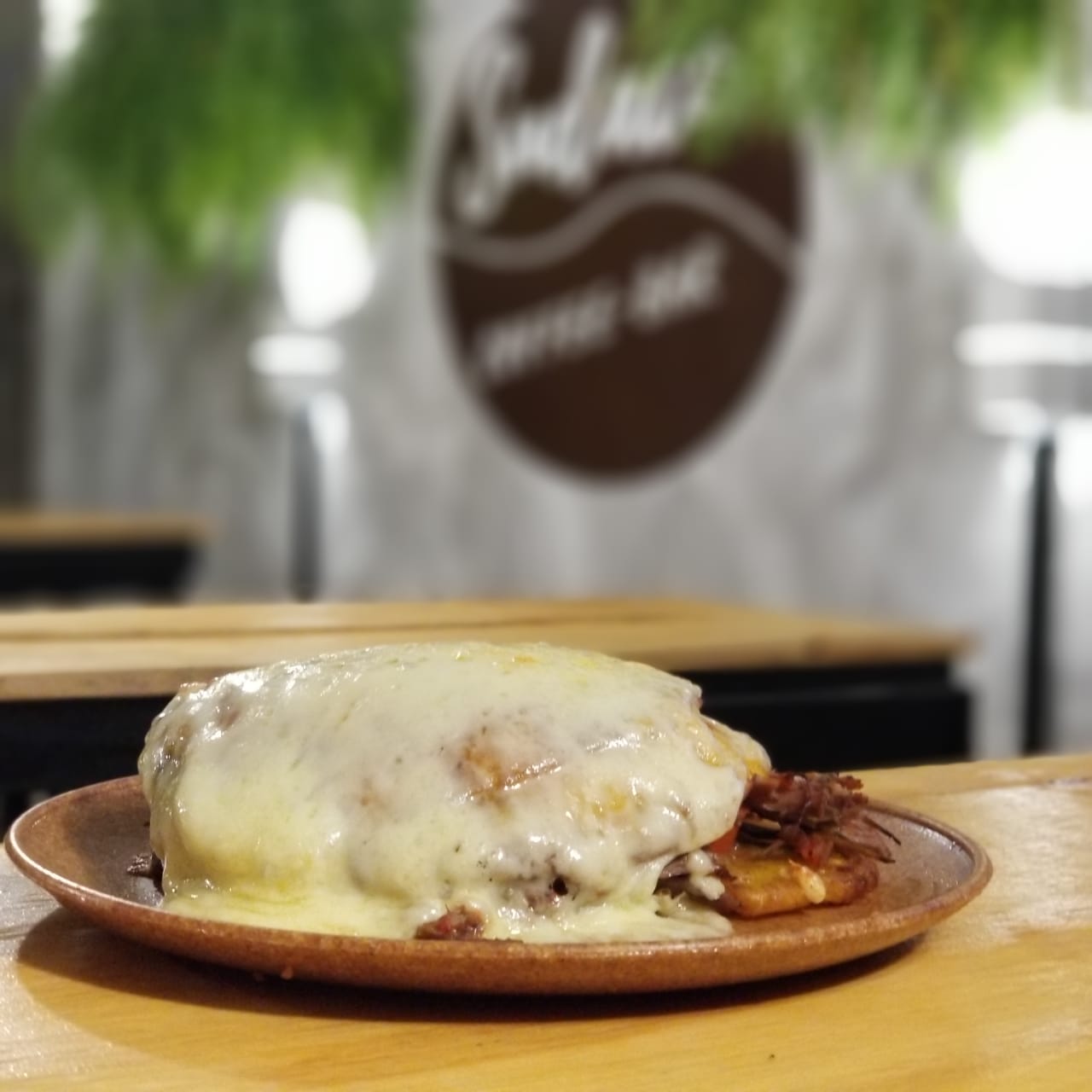 O patacón com a banana madura é mais adocicado e servido gratinado. Foto: Divulgação O patacón com a banana madura é mais adocicado e servido gratinado. Foto: Divulgação