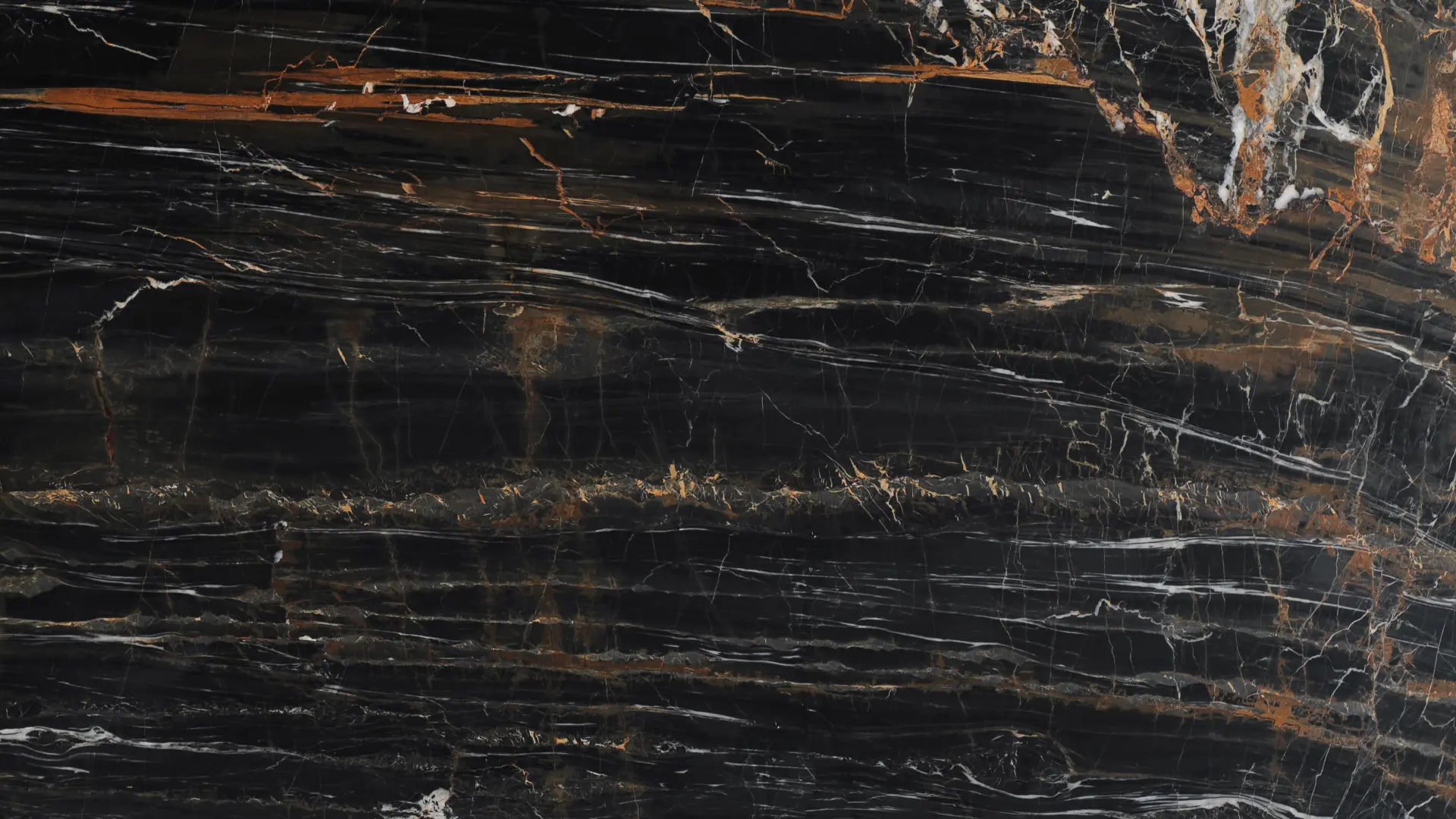 O impacto do mármore escuro é capaz de enriquecer a característica decorativa de qualquer ambiente. Produto: Cerro Portoro.