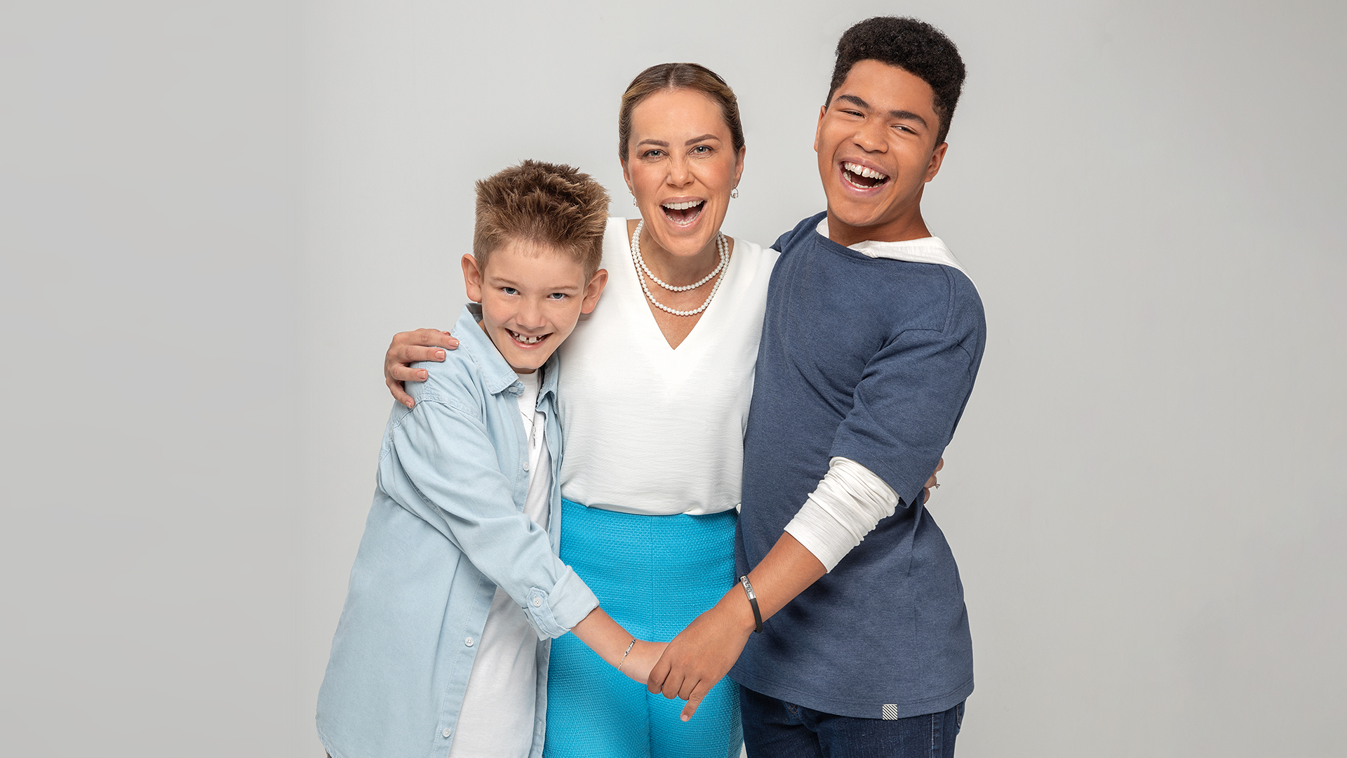 Adriana Milczevsky e seus filhos João Marcelo, de 9 anos, e Marcelo, de 15 anos, que nasceram pela adoção