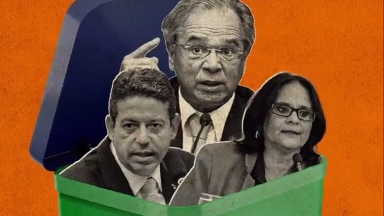 Exposição mostrava imagem de Lira, Damares e Guedes dentro de um cesto de lixo coberto pela bandeira do Brasil.