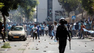 Grupos de Eritreus brigam em Haia, na Holanda.