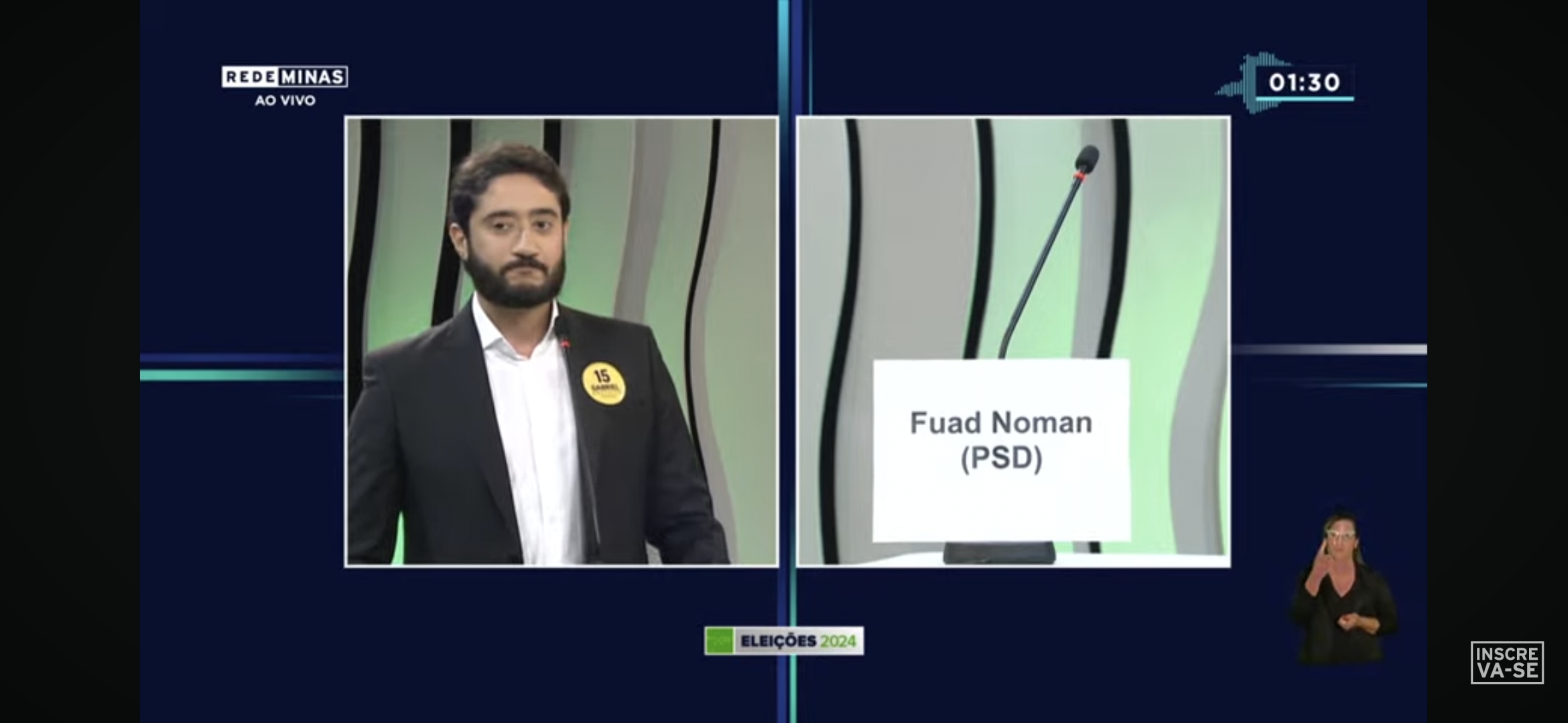 O candidato Gabriel Azevedo (MDB) faz pergunta ao “candidato ausente” Fuad Noman (PSD) durante o debate na Rede Minas.