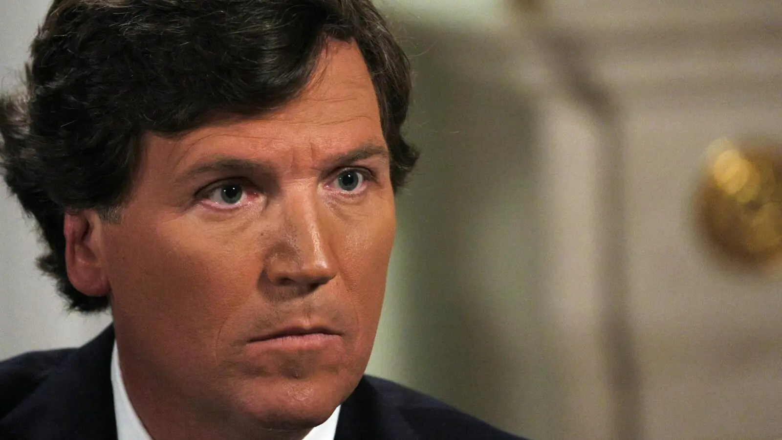 Tucker Carlson durante entrevista com Vladimir Putin em Moscou