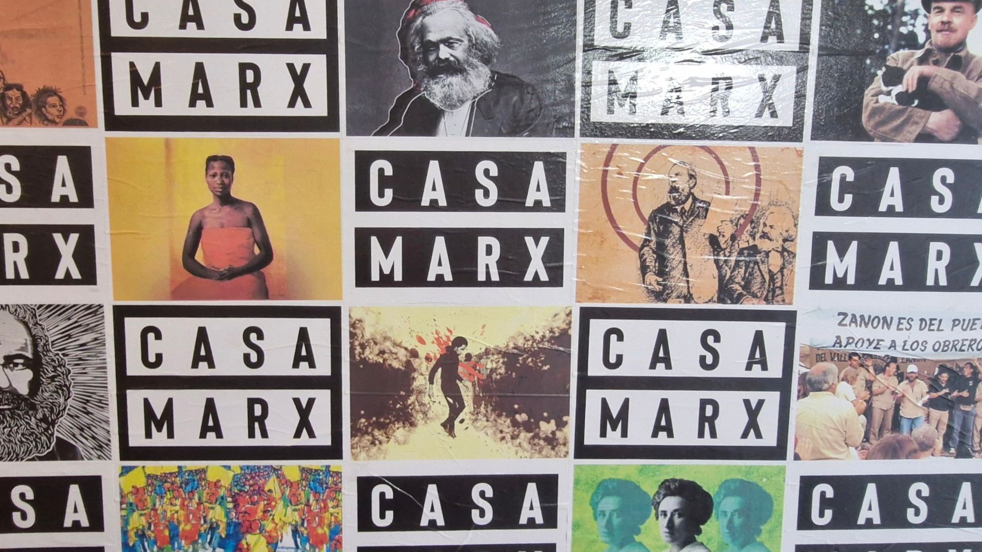 Decorada com lambe-lambes, a Casa Marx homenageia figuras como Karl Marx, Vladimir Lenin e Rosa Luxemburgo
