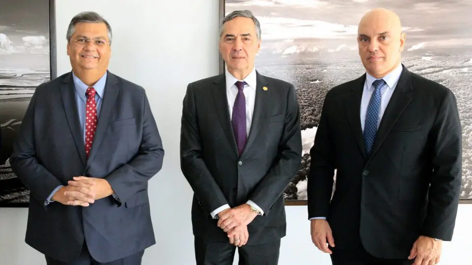 Ministros Flávio Dino, Luís Roberto Barroso e Alexandre de Moraes, fotografados em dezembro de 2023.