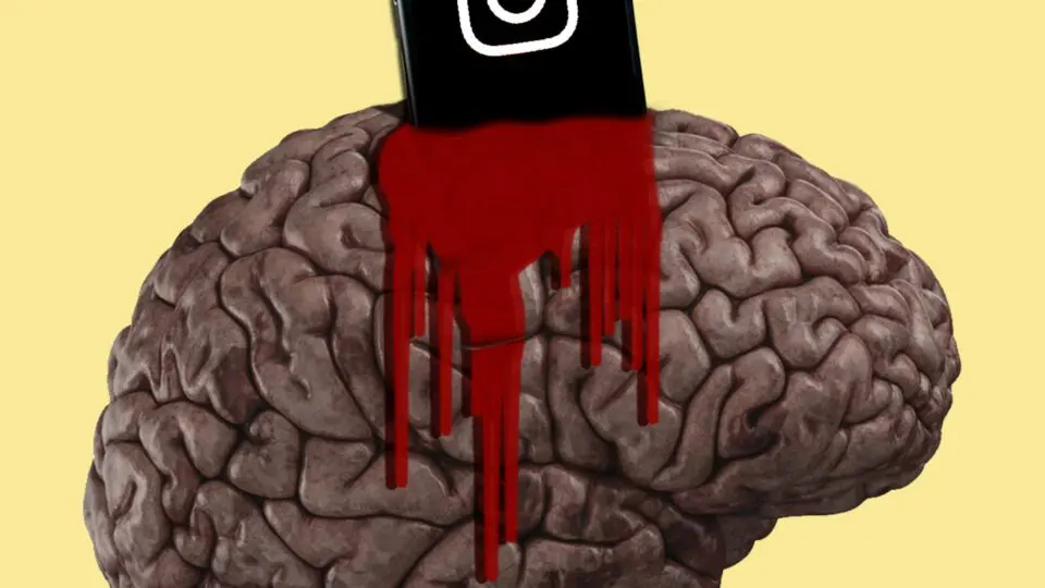 Ilustração de um cérebro sendo machucado por um celular. Mostrando que passar muito tempo em frente às telas faz mal para o desenvolvimento cerebral.