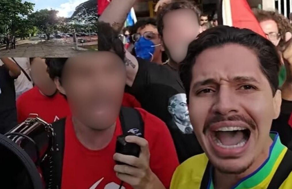 Wilker Leão em um dos vídeos publicados nas redes sociais: alunos de esquerda o expulsam de um ato público aos gritos de &#8220;recua, fascista, recua&#8221;