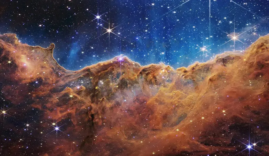 Image of cosmic cliffs, recorded by the James Webb Telescope.
