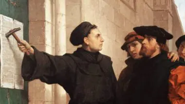 Detalhe de pintura de Ferdinand Pauwels mostrando o momento em que Lutero afixou as 95 teses na porta da igreja em Wittemberg.