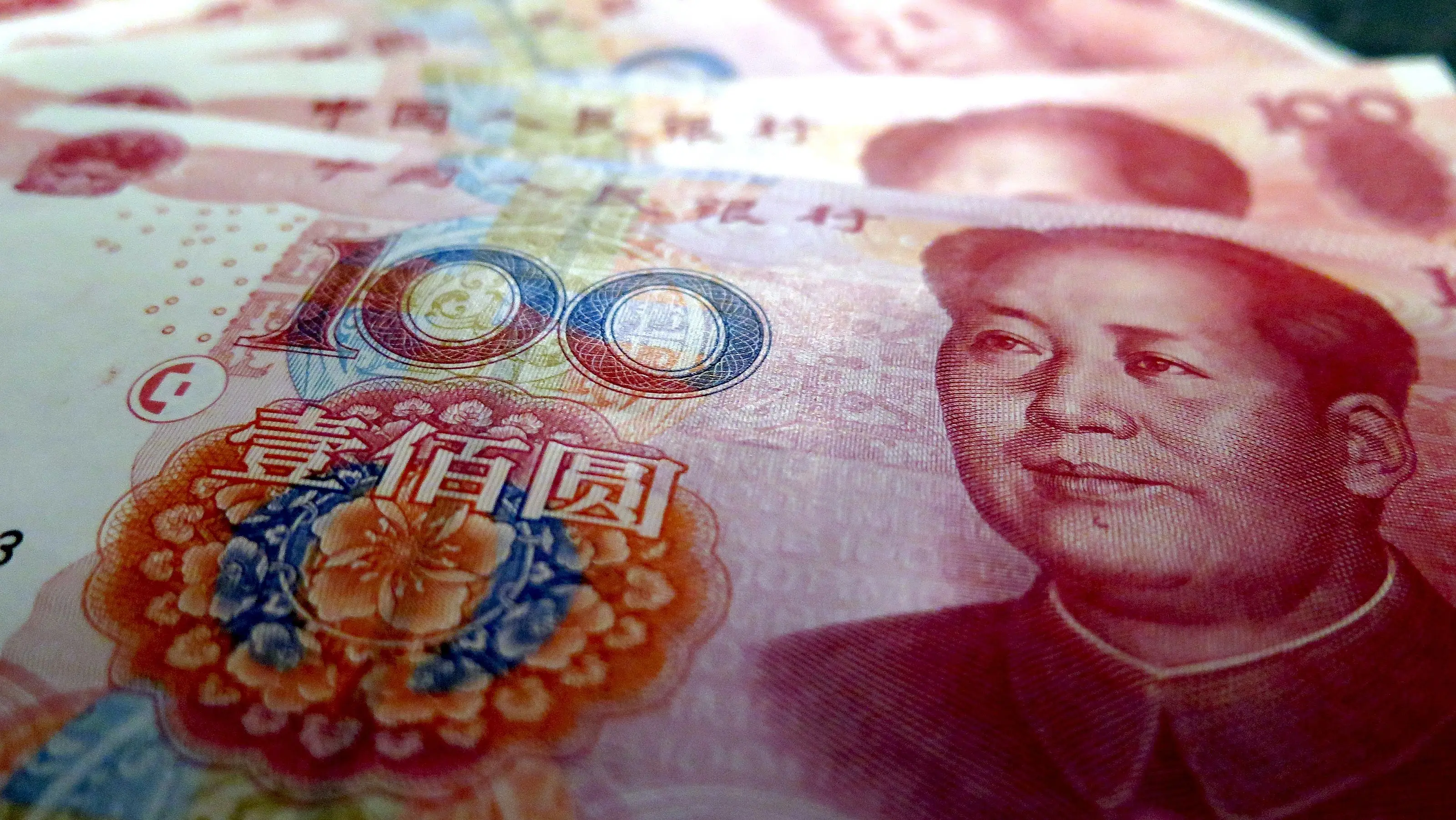 divida moeda chinesa yuan