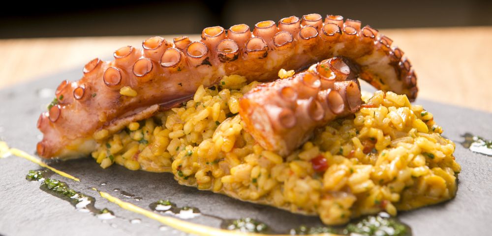 Arroz de polvo. Foto: Rodrigo Capote/Divulgação