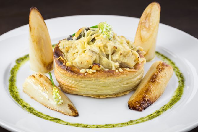 O prato Bouchée leva cubos de congro salteados em Chardonnay sobre vol-au-vent. Foto: Divulgação O prato Bouchée leva cubos de congro salteados em Chardonnay sobre vol-au-vent. Foto: Divulgação