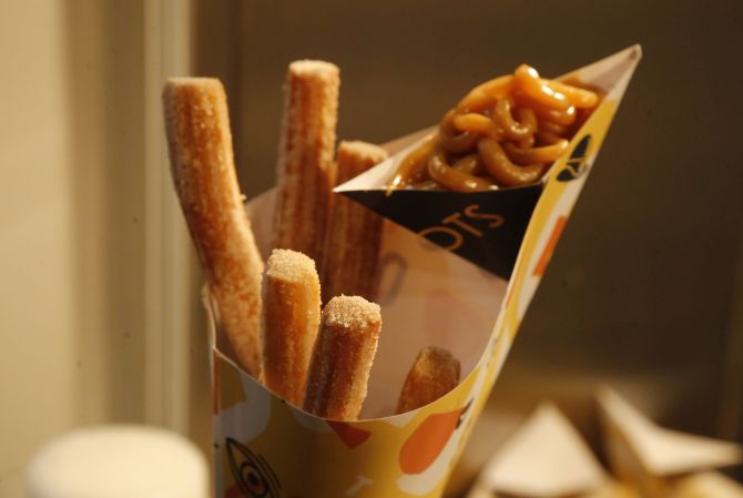 Churros com doce de leite do Roots. Foto: Pedro Serapio/Gazeta do Povo Churros com doce de leite do Roots. Foto: Pedro Serapio/Gazeta do Povo