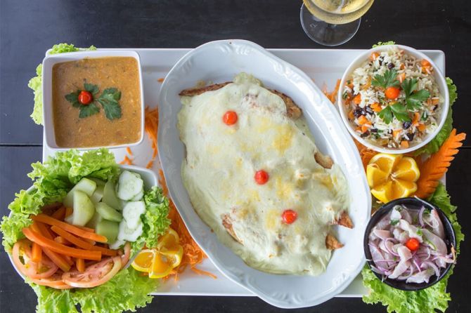 Combinado de tilápia do restaurante La Bodeguita no balneário Betaras, em Matinhos. Foto: Divulgação. Combinado de tilápia do restaurante La Bodeguita no balneário Betaras, em Matinhos. Foto: Divulgação.