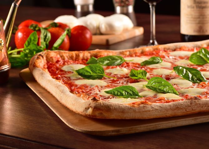 A pizza Napoli é o carro-chefe da casa. Foto: Divulgação. A pizza Napoli é o carro-chefe da casa. Foto: Divulgação.