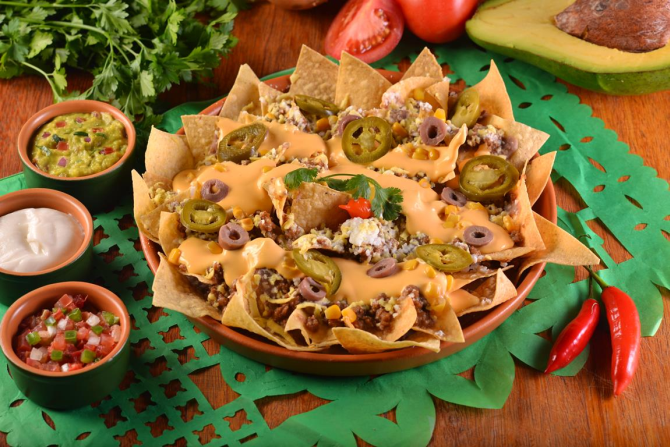 Na versão vegana, os nachos são feitos com chili de carne de soja e cheddar de abóbora. Sai por R$ 43,80. Na versão vegana, os nachos são feitos com chili de carne de soja e cheddar de abóbora. Sai por R$ 43,80.