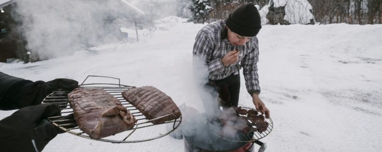 Cezin Nottaway, an Algonquin who runs a catering business, smokes moose meat using a method she learned from her grandmothers in Maniwaki, Quebec, Canada, Dec. 28, 2017. Nottaway is part of a rising generation of indigenous cooks and scholars who are trying to preserve and spread the food culture of their ancestors. (Renaud Philippe/The New York Times)