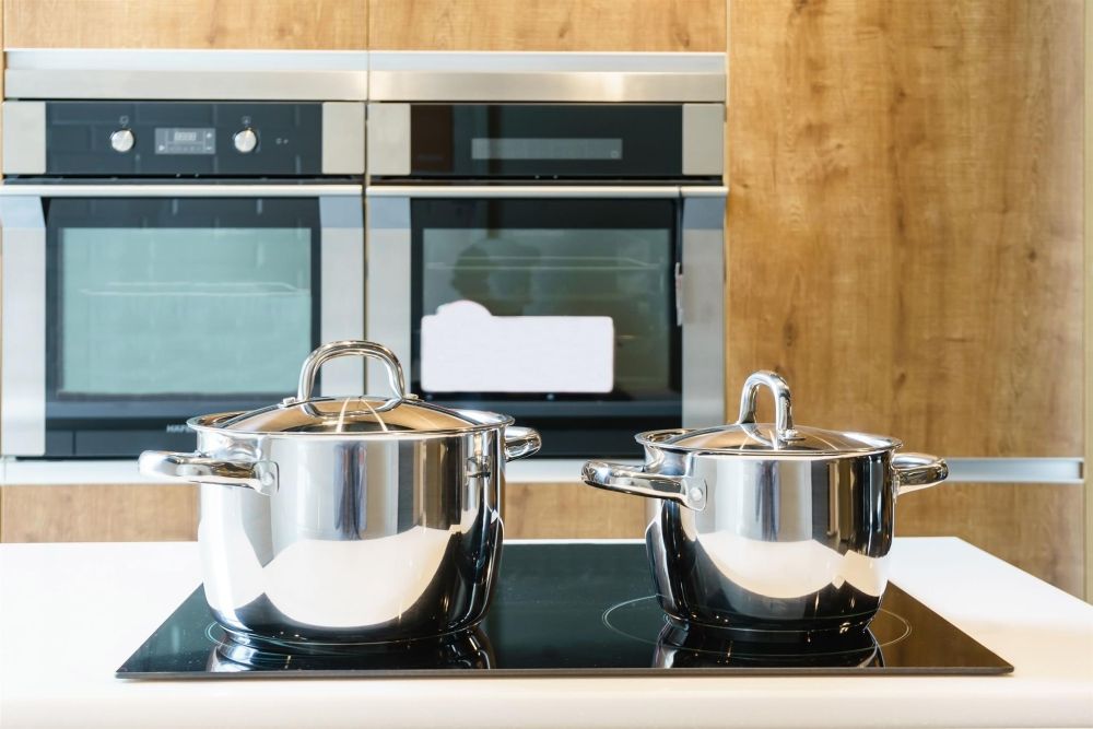 Os cooktops são mais usados em cozinhas planejadas ou com pouco espaço disponível. Foto: Bigstock. Os cooktops são mais usados em cozinhas planejadas ou com pouco espaço disponível. Foto: Bigstock.
