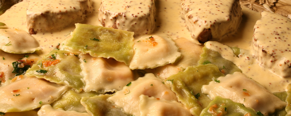 Filetto mostarda con ravioloni, da Barolo Trattoria. Foto: Divulgação. 
