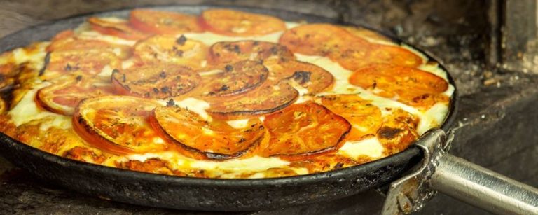Pizza da piazziar Guerrin, em Buenos Aires. Foto: Divulgação.