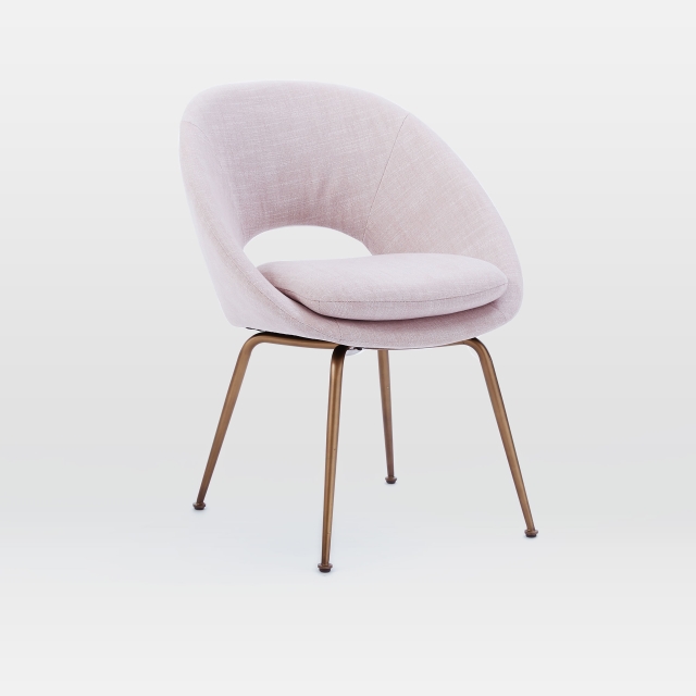 West Elm’s Orb upholstered dining chair comes in a Dusty Blush fabric ($249, westelm.com).
MUST CREDIT: West Elm West Elm’s Orb upholstered dining chair comes in a Dusty Blush fabric ($249, westelm.com).
MUST CREDIT: West Elm