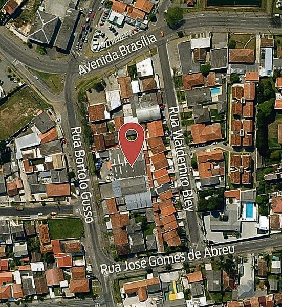 No mapa, a exata localização do centro geográfico de Curitiba, e, abaixo, a fachada da empresa Eletrobit No mapa, a exata localização do centro geográfico de Curitiba, e, abaixo, a fachada da empresa Eletrobit