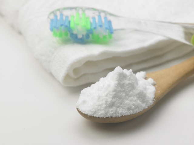 Toothbrush and baking soda to clean Toothbrush and baking soda to clean