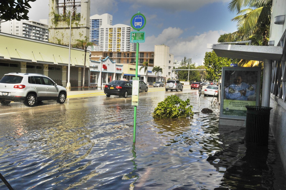 MIAMI SOUTH BEACH - FLORIDA OCTOBER 28: Miami South beach street flood aftermath of Hurricane Sandy on october 28 2012 in Miami South Beach MIAMI SOUTH BEACH - FLORIDA OCTOBER 28: Miami South beach street flood aftermath of Hurricane Sandy on october 28 2012 in Miami South Beach