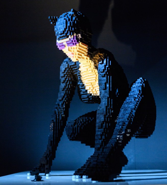 THE ART OF THE BRICK: DC SUPER HEROES - Artist Nathan Sawaya returns to London with the world's largest LEGO exhibition, inspired by Batman, Superman, and Wonder Woman. The exhibition opens, in a purpose-built marquee in Doon Street car park, Upper Ground, on the South Bank. Picture shows: Perched (Catwoman) THE ART OF THE BRICK: DC SUPER HEROES - Artist Nathan Sawaya returns to London with the world's largest LEGO exhibition, inspired by Batman, Superman, and Wonder Woman. The exhibition opens, in a purpose-built marquee in Doon Street car park, Upper Ground, on the South Bank. Picture shows: Perched (Catwoman)