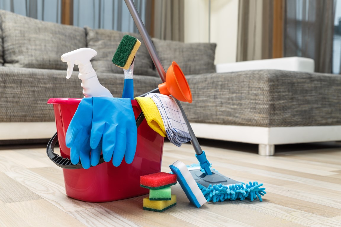 Cleaning service. Bucket with sponges, chemicals bottles and mopping stick. Rubber gloves, plunger and towel. Household equipment. Cleaning service. Bucket with sponges, chemicals bottles and mopping stick. Rubber gloves, plunger and towel. Household equipment.