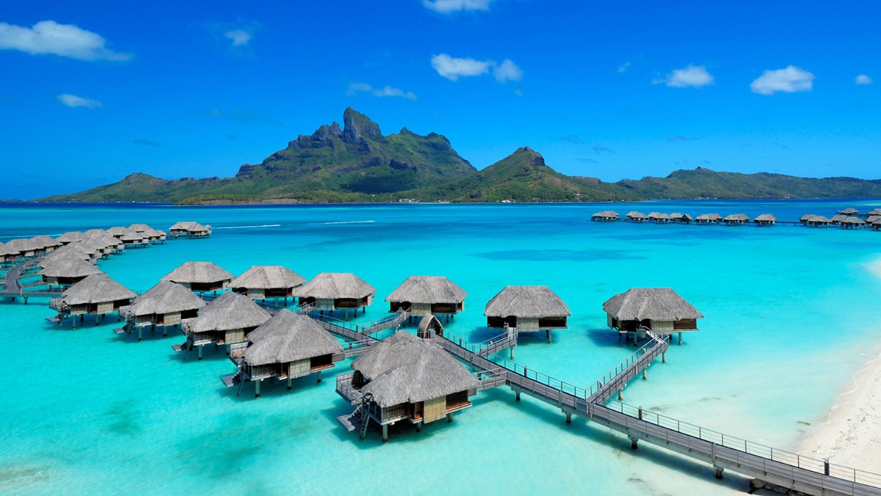 O cenário paradisíaco da ilha de Bora Bora, na Polinésia Francesa. O cenário paradisíaco da ilha de Bora Bora, na Polinésia Francesa.