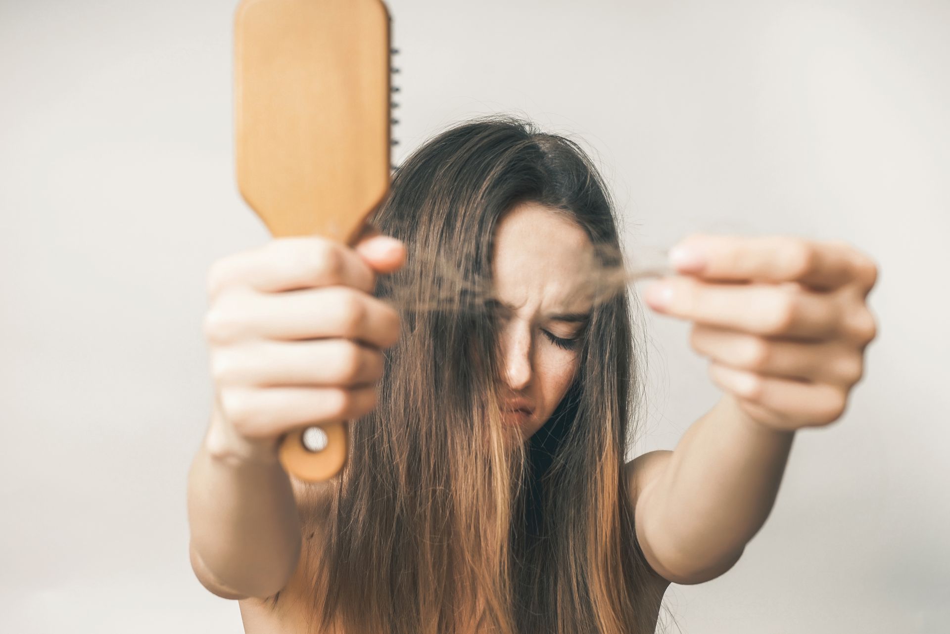 Hairs lost,woman with comb, long hair, angry girl Hairs lost,woman with comb, long hair, angry girl