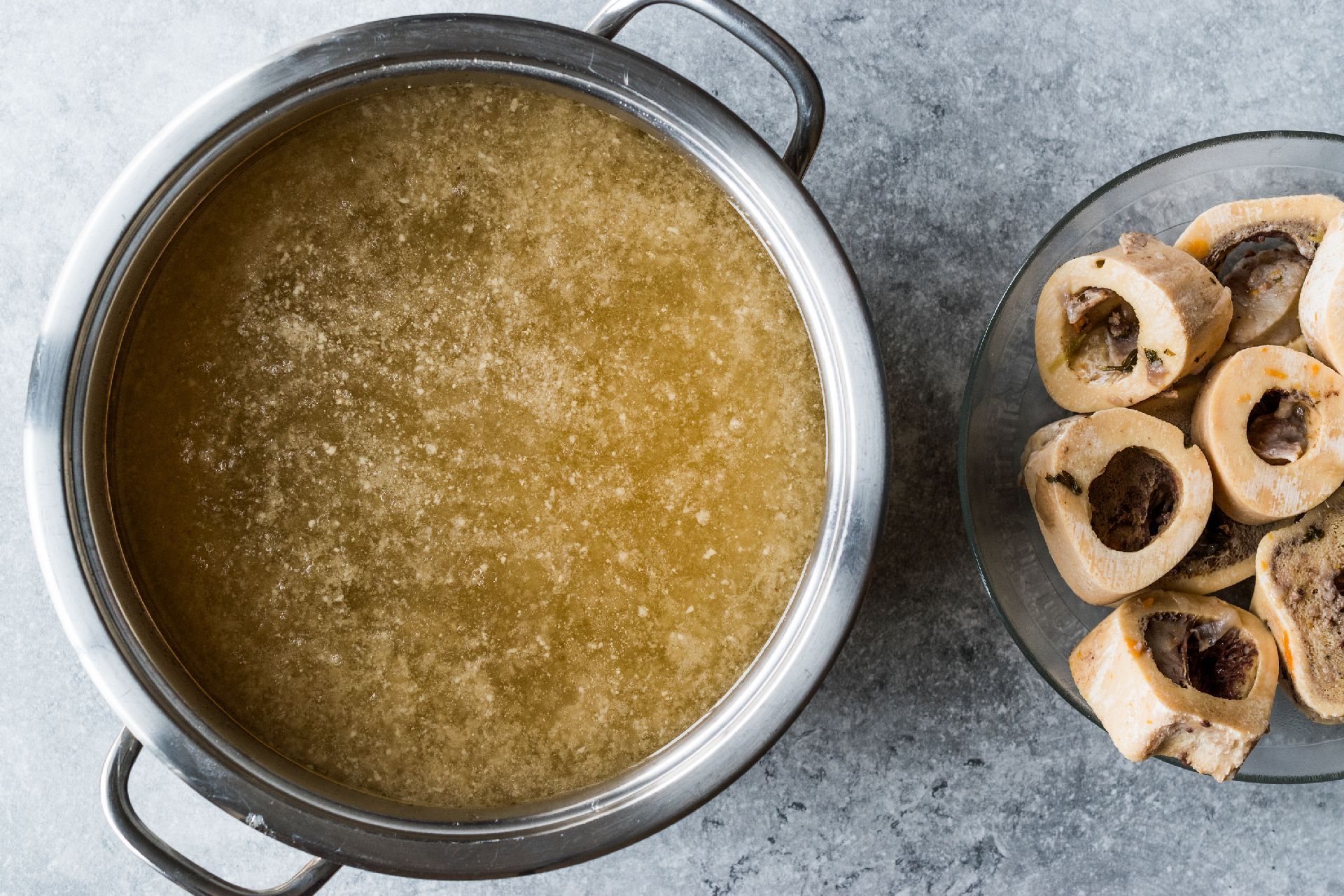 Bone Broth Bouillon in Metal Pan. Organic Food. Bone Broth Bouillon in Metal Pan. Organic Food.