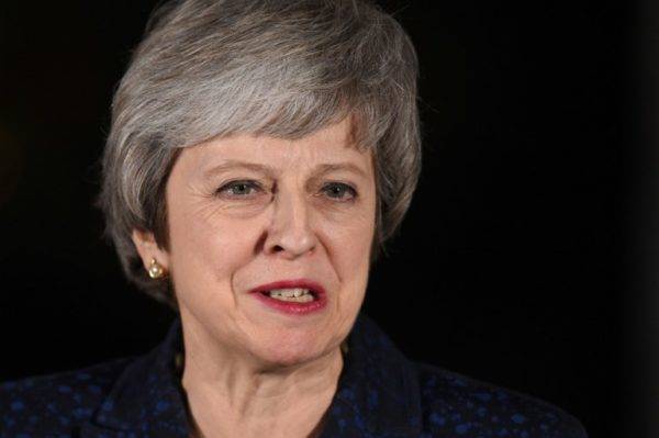 A primeira-ministra Theresa May faz um pronunciamento após vencer o voto de confiança, em Londres, 12 de dezembro. Foto: Oli SCARFF / AFP